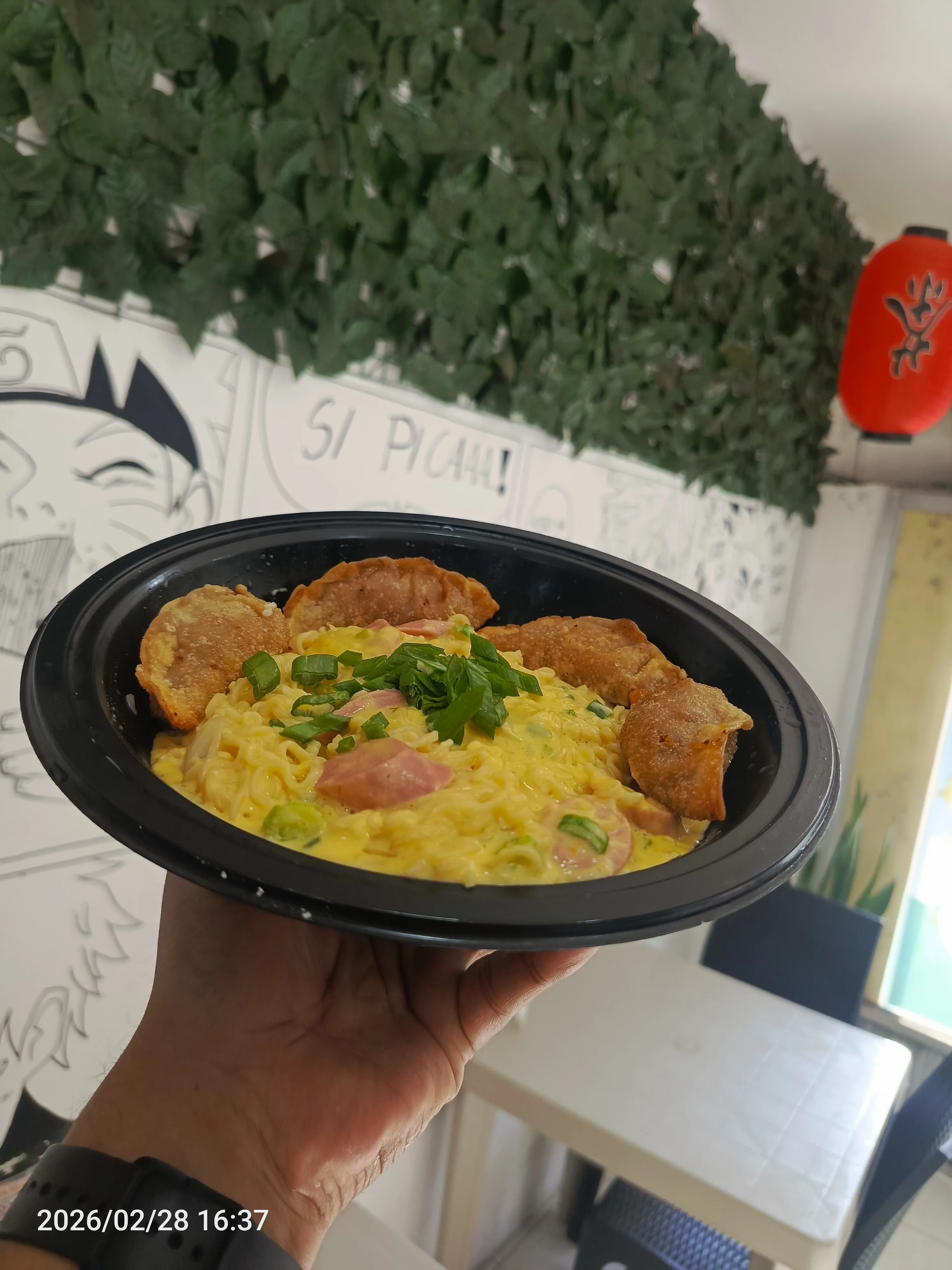 Cheesse ramen con gyozas